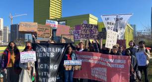 Protesters in front of Dot Dot Dot offices